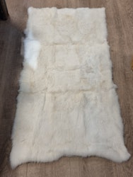 Teppe av kaninskinn