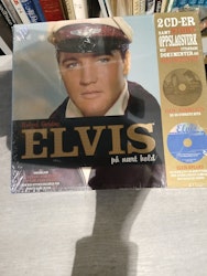 Elvis , ligger i orginal innpakking