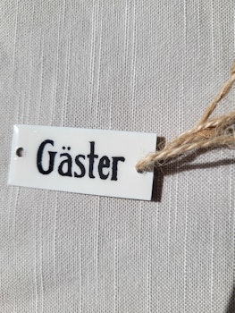 Skylt Gäster