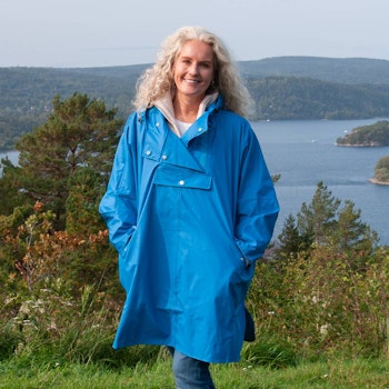 Regnponcho i blå fra Rosenvinge