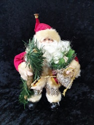 Tomte med silvriga byxor och glittrig rödrock