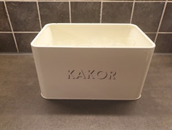 Plåtburk med texten KAKOR