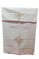 Handduks skydd i linne broderad