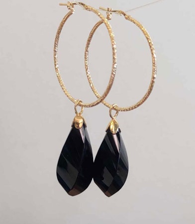 Förgyllda silverörhängen med stora droppslipade onyx