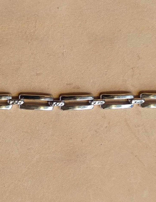 Olika silverarmband