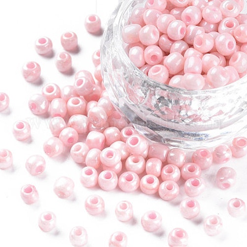 Seed bead rosa 4mm ojämna 25gram