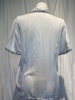 Vit blus med marina detaljer