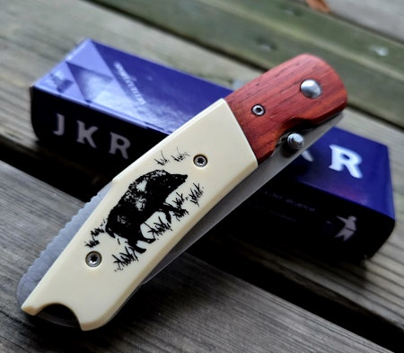 Fällkniv med djurmotiv JKR