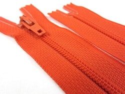 D072 Blixtlås 15 cm Opti 4 mm spiral ej delbar mörkorange
