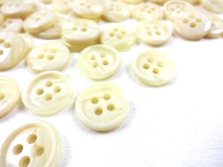 K096 Knapp 15 mm melerad ljusbeige