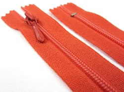 D108 Blixtlås 15 cm 4 mm spiral ej delbar mörkorange