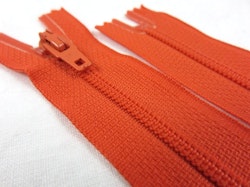 D072 Blixtlås 18 cm Opti 4 mm spiral ej delbar mörkorange