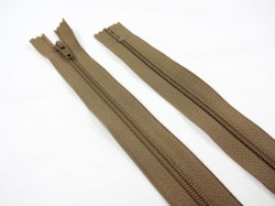 D122 Blixtlås 25 cm 4 mm spiral ej delbar beige