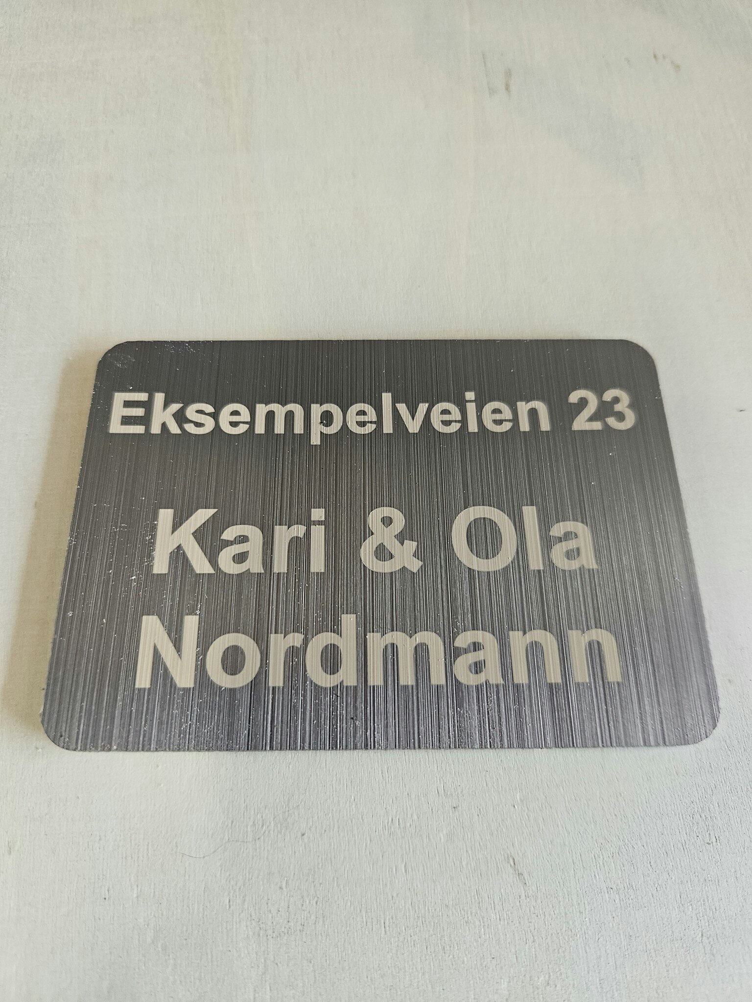 Postkasseskilt børstet stål