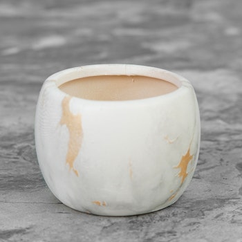 Rund blomkrukor marmor design