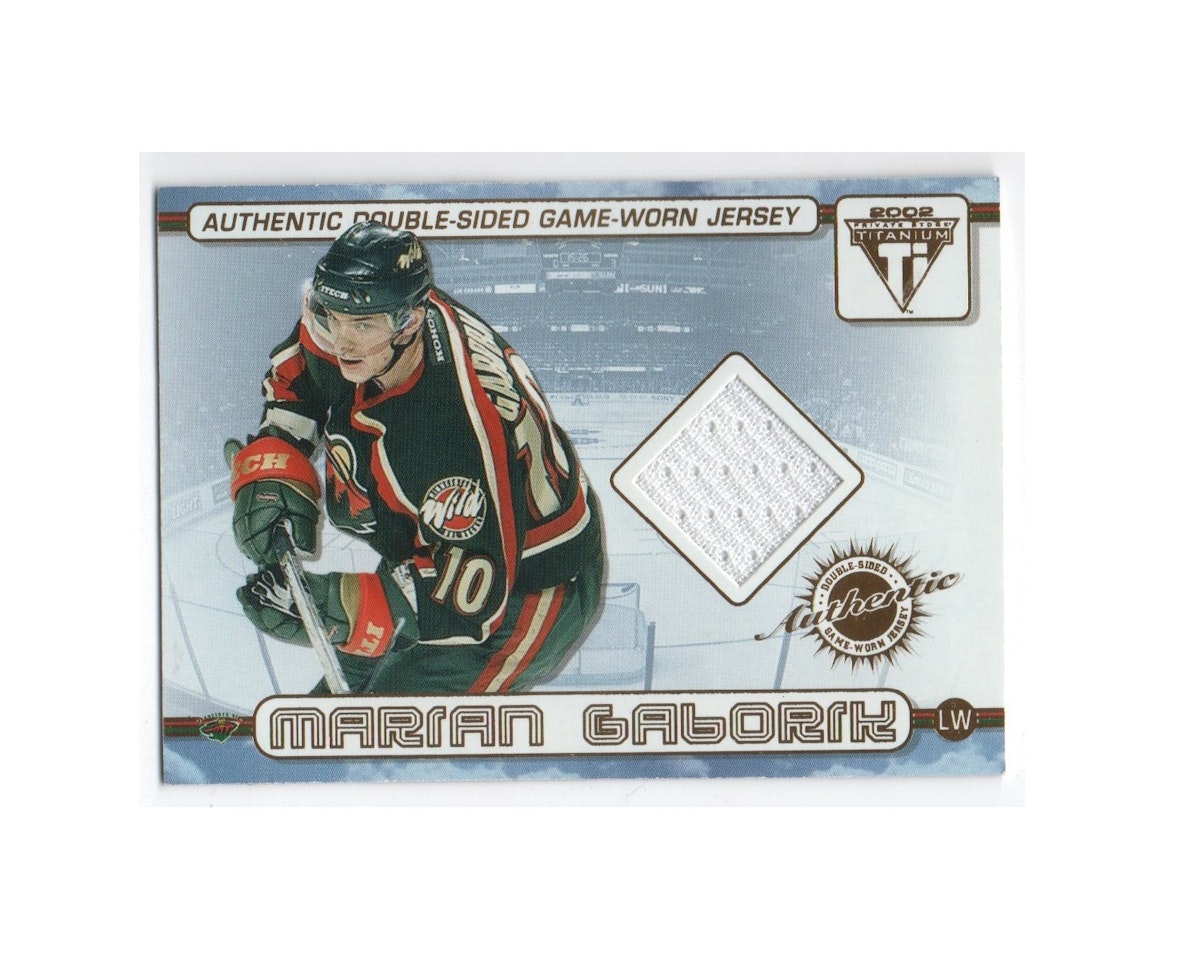 2001-02 Titanium Double-Sided Jerseys #67 Marian Gaborik Manny Fernandez (40-X205-NHLWILD)