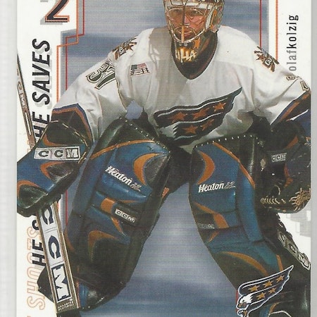 2002-03 Between the Pipes He Shoots He Saves Points #14 Olaf Kolzig 2 pt. (10-X138-CAPITALS)