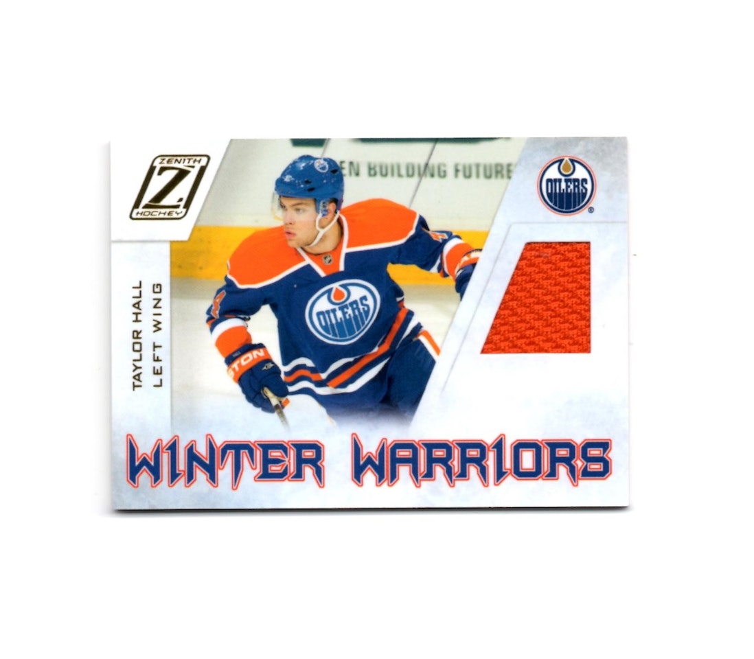 2010-11 Zenith Winter Warriors Materials #TH Taylor Hall (60-X84-OILERS)