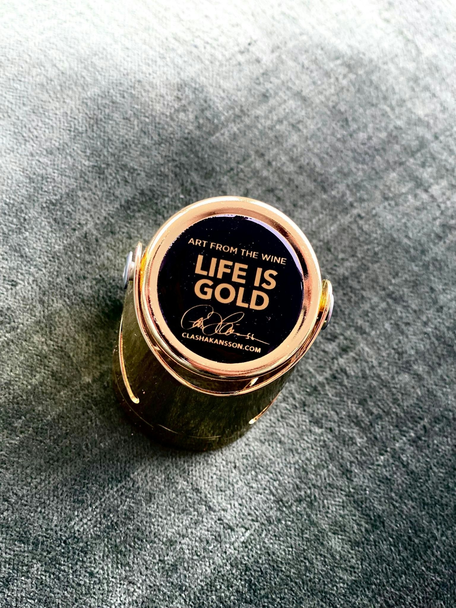 LIFE IS GOLD - CHAMPAGNE STOPPER