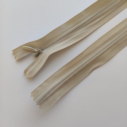 Osynligt, dolt blixtlås, 18 cm. Ljusbeige.