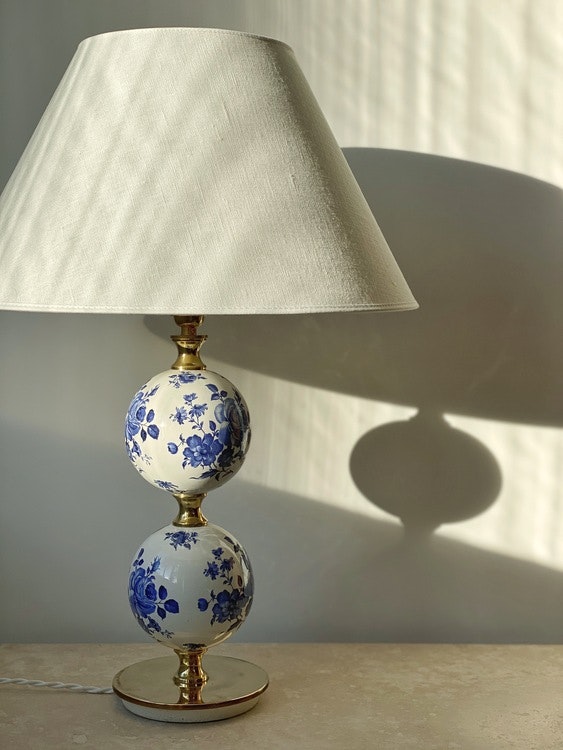 Stilarmatur Table Lamp in White Porcelain with flowers. 1960s.