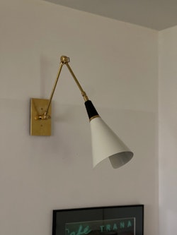 Pair of Brass Wall Lamps in the Style of Stilnovo, black & white.