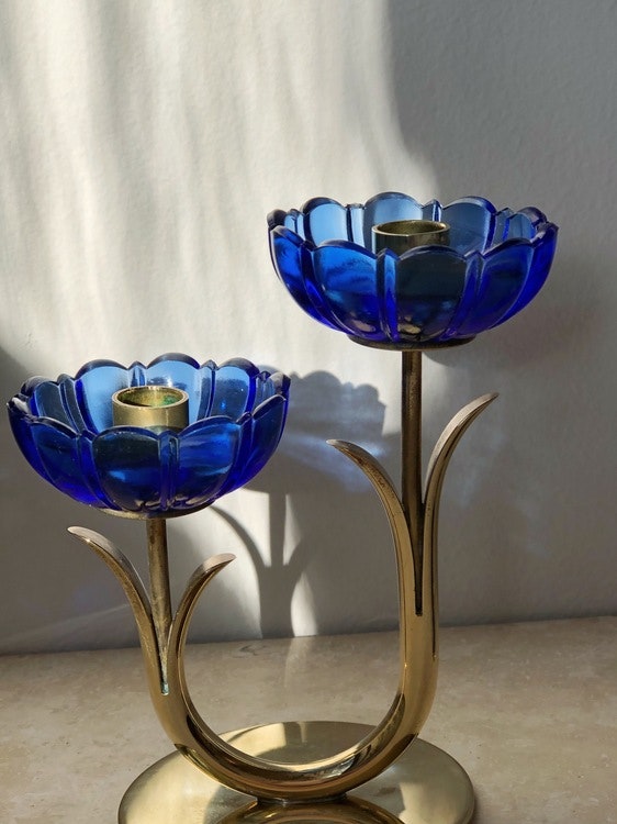 Gunnar Ander set of 2 Brass Candle Holders by Ystad Metall with blue glass flowers. 1960s.