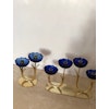 Gunnar Ander set of 2 Brass Candle Holders by Ystad Metall with blue glass flowers. 1960s.
