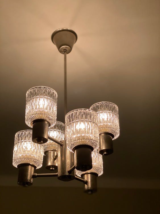 Tyringe 6-armed Crystal Chandelier with textured Glass Shades. 1960s.