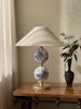 Stilarmatur Table Lamp in White Porcelain with flowers. 1960s.