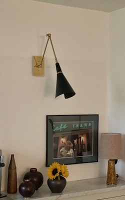 Pair of Black Wall Lamps in the Style of Stilnovo.