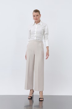 Rak skurna byxor för kvinnor beige