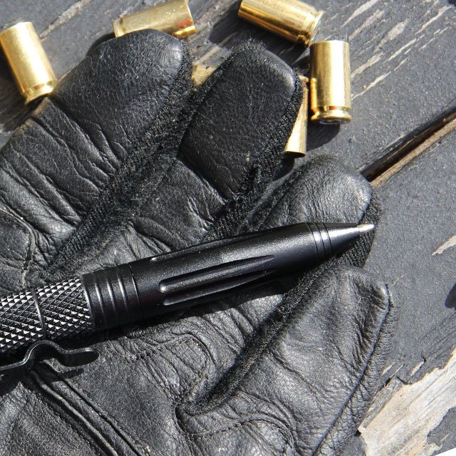 Pen Tactical Black in a pair of OPPO gloves.