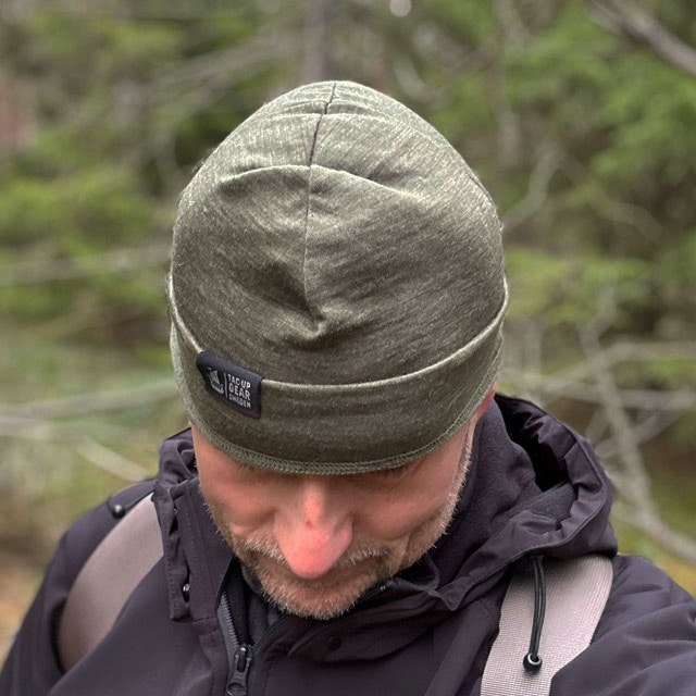 Beanie Merino Wool Green from TAC-UP GEAR seen mounted on a model and showing the top