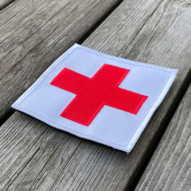 Medic Red Cross Hook Patch from TAC-UP GEAR seen from an angle