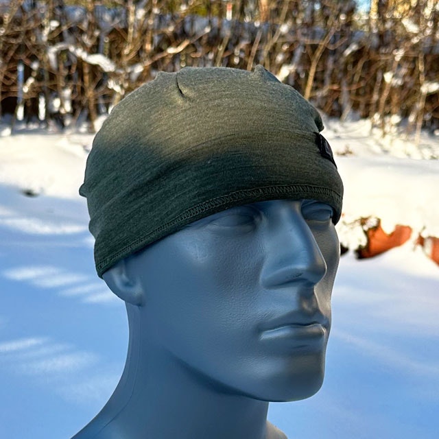 A Beanie Merino Wool Green from TAC-UP GEAR seen from the side