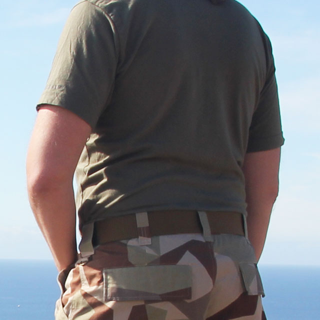 Worn Expedition Belt Coyote on camo shorts.