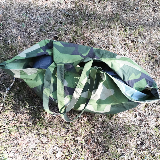 The Biggie Bag M90 seen from above loaded with soft items like sleeping bag