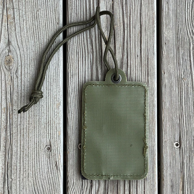 The backside of a Card holder Hook and Loop Green from TAC-UP GEAR