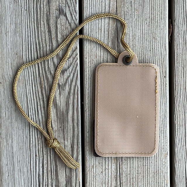 The backside of a Card holder Hook and Loop Tan