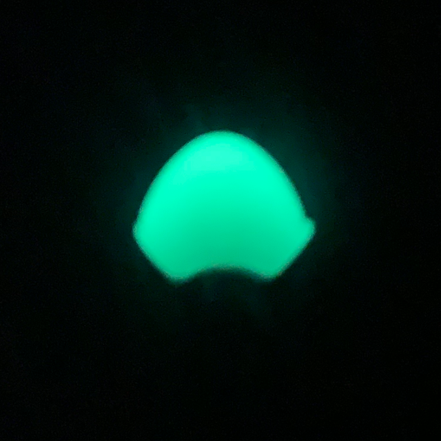 Cord End Glow In The Dark shown in the dark