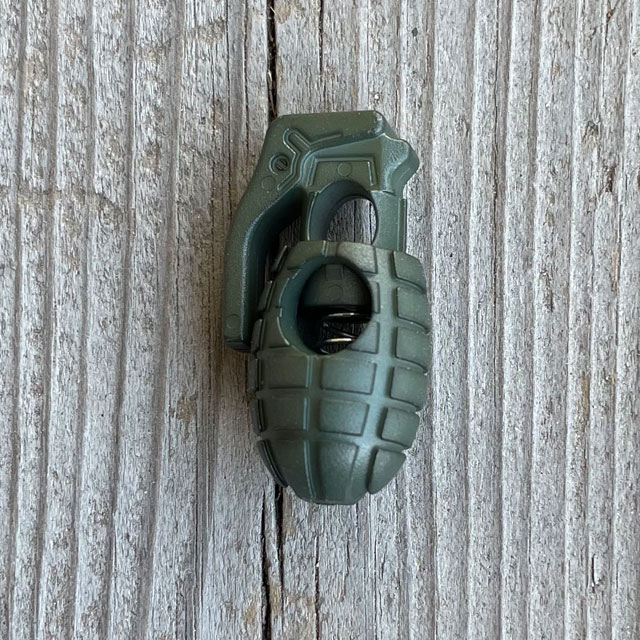 A Cord Lock Grenade Green from TAC-UP GEAR seen full front
