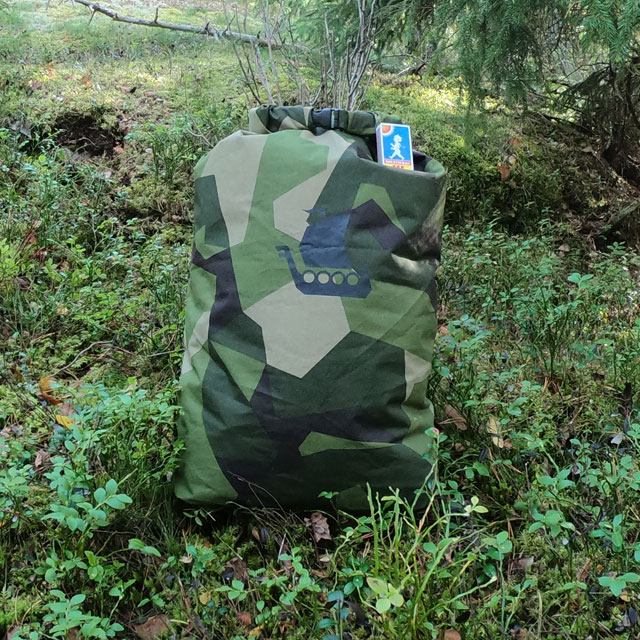 M90 camouflage dry sack (large size) in Swedish wooded scenery