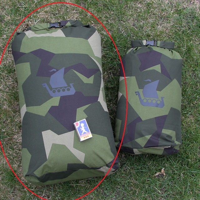 The Dry Sack M90 sack to the left is the Large size and the one on the right is Medium size
