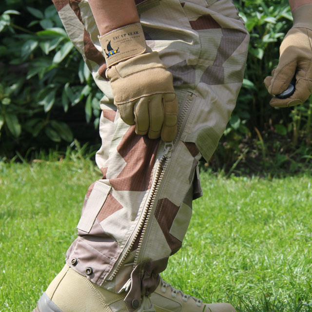 Field Trousers M90K Desert worn and bottom leg zipper is opened.