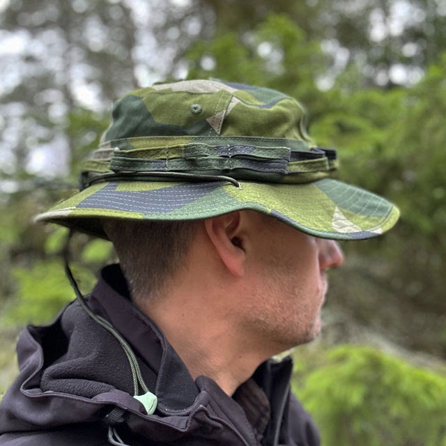 Model wearing a Floppy Hat M90 NCWR from TAC-UP GEAR seen from the side