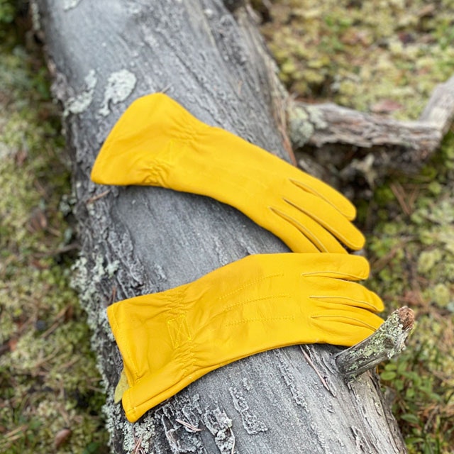 Bushcraft Leather Glove Cavalry from TAC-UP GEAR  on a log