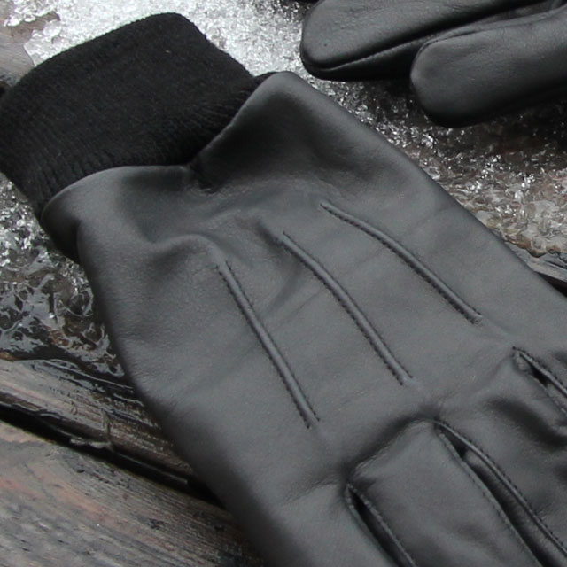 Three stripe upper close up on a Officer Black Leather Glove.