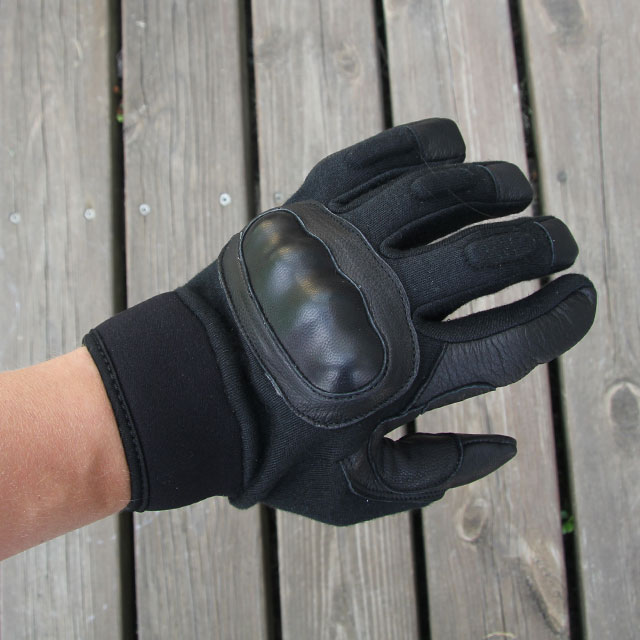 Black knuckle protected tactical glove.