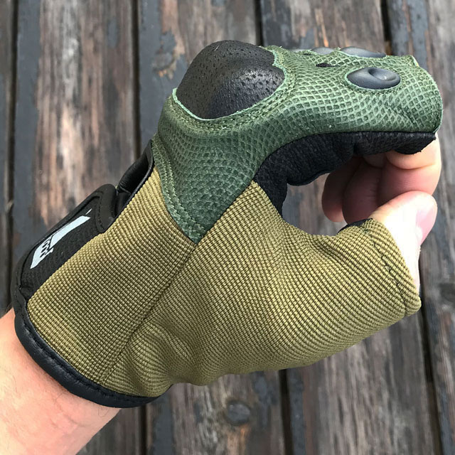 Reptile type look on  a side view  of a Short Finger Tactical Glove Green